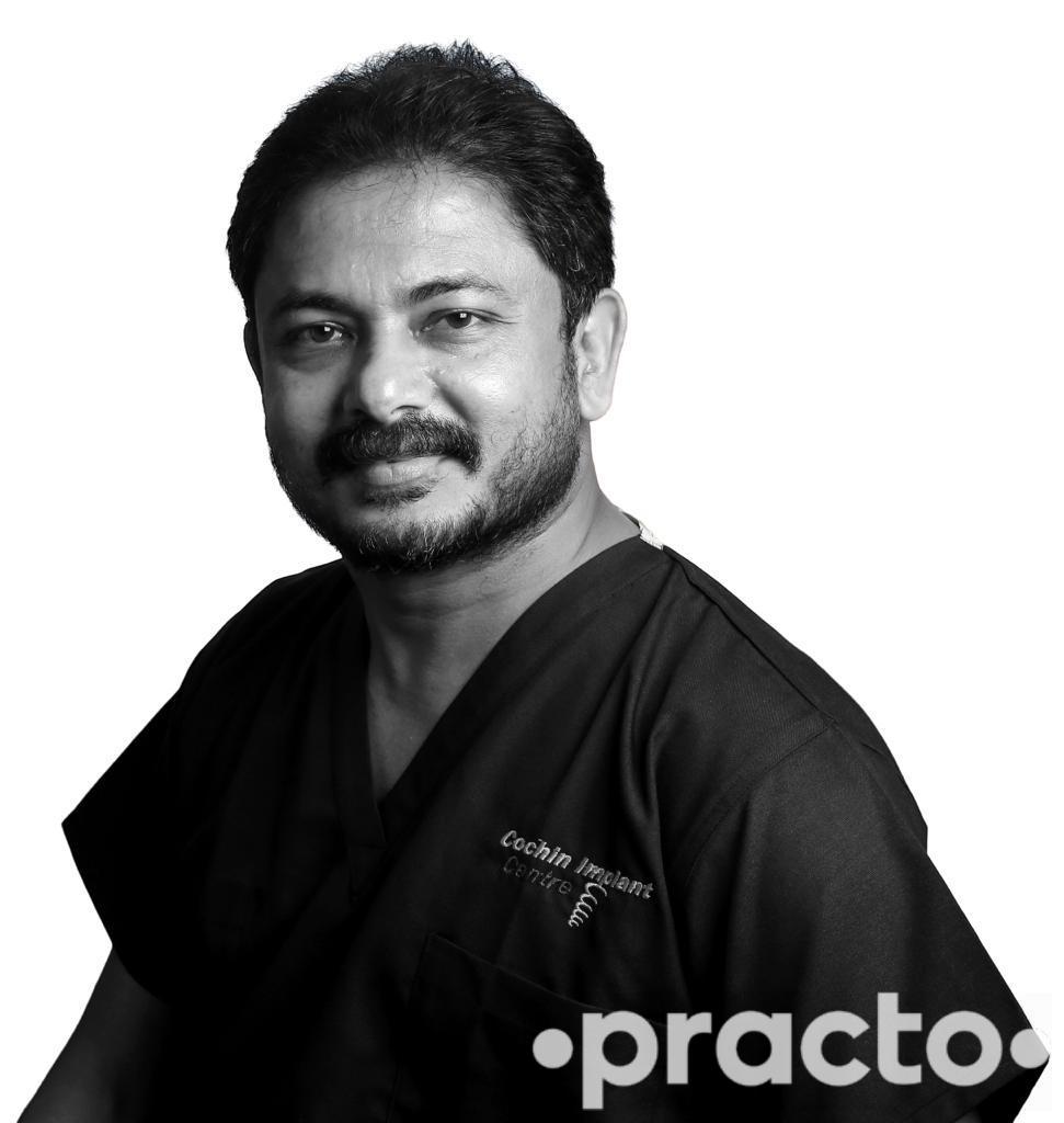 Dr. Jaibin George – Top Implantologist Doctor Near Me in