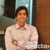 Dr. Raja Mahendra Katari - Dentist