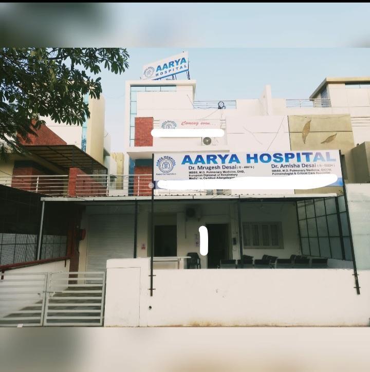 Establishment board at Aarya Hospital Sun Pharma Road Vadodara