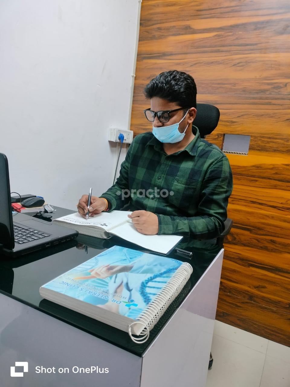 Consultation Room at Dr. Neeraj Clinic Alpha II Greater Noida