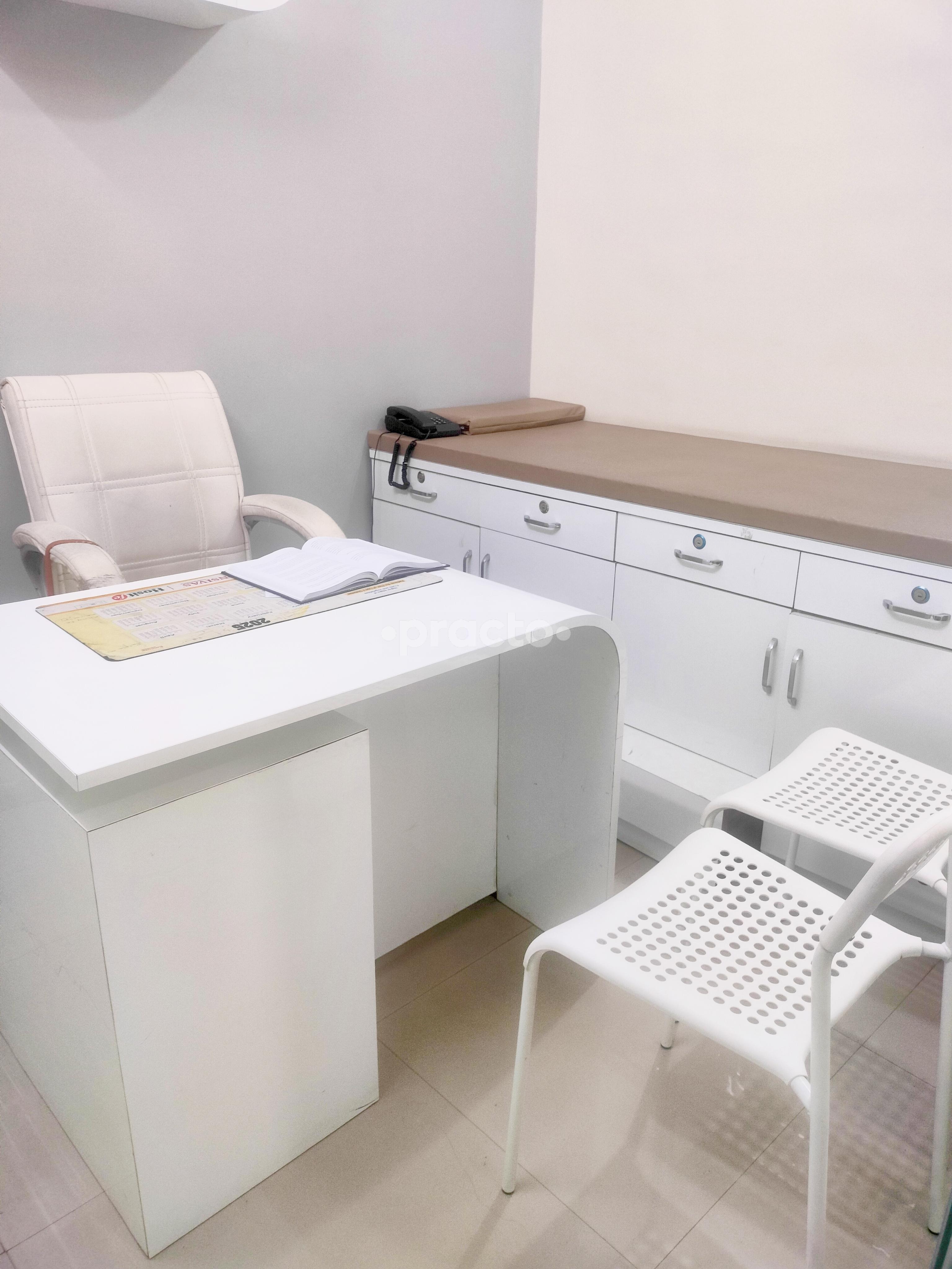 Consultation Room at Dr. Neha Chaudhari (MD) Homeopathic Consultant clinic Ravet Pune