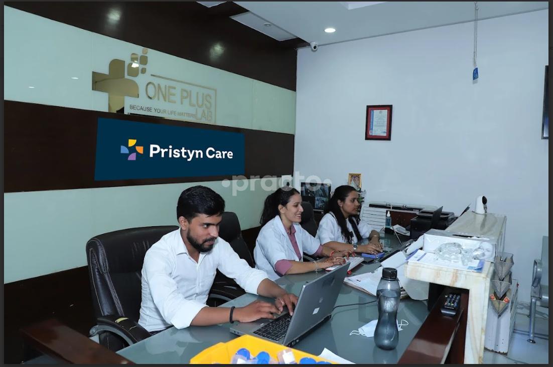 Reception Area at Pristyn Care- One Plus Lab Sector 51 Noida